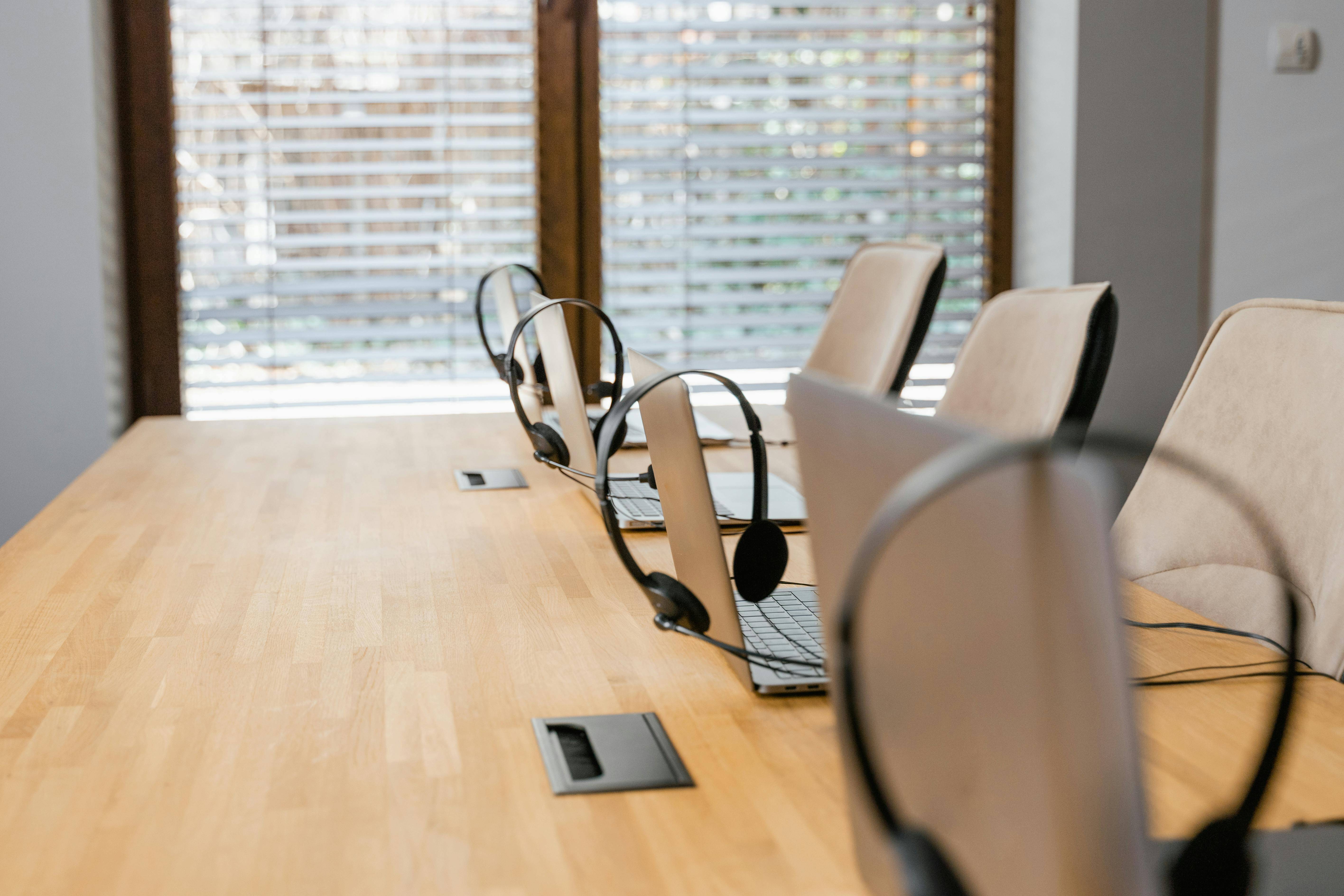 CCaaS Innovation. Contact Center equipment on a desk.