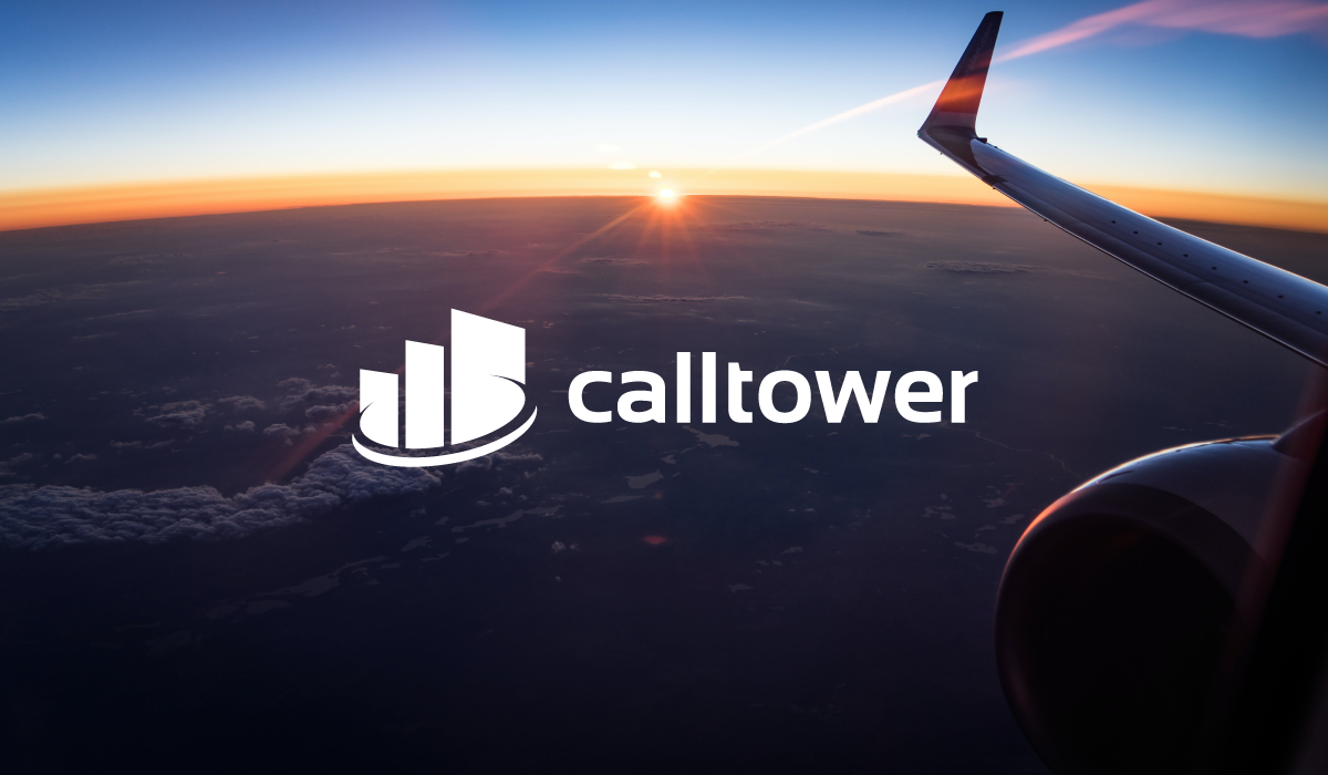 airplane wing overlooking the clouds with a calltower logo 
