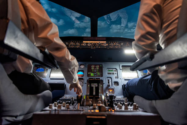 Two pilots in and airplane cockpit