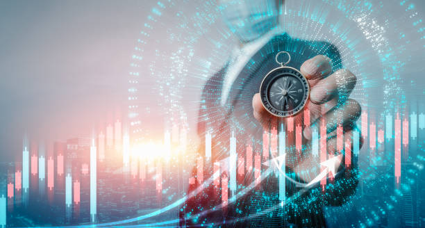 A businessman with a compass stands before a stock chart, representing guidance in financial decision-making.