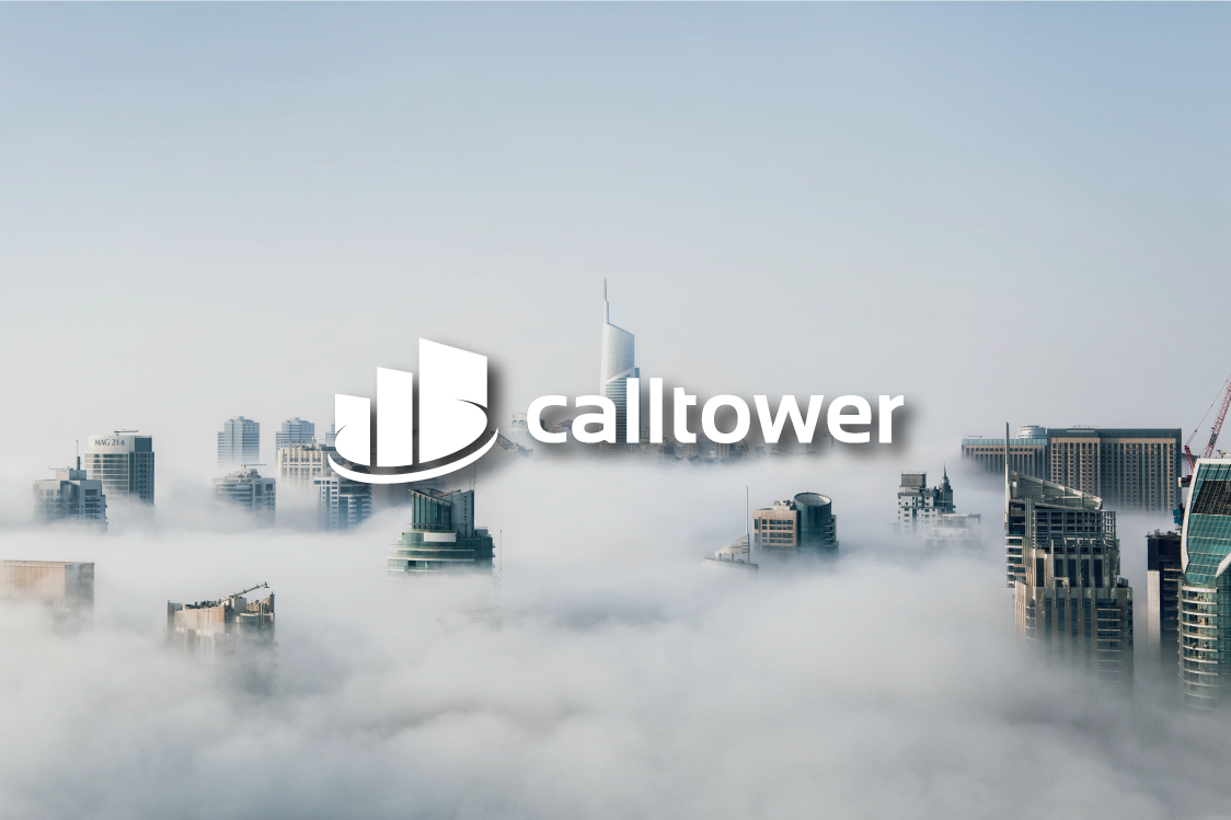 a city with clouds in the sky and calltower logo